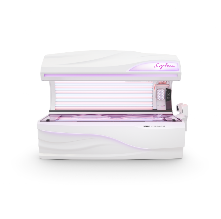 White Ergoline tanning bed with purple accent lighting.
