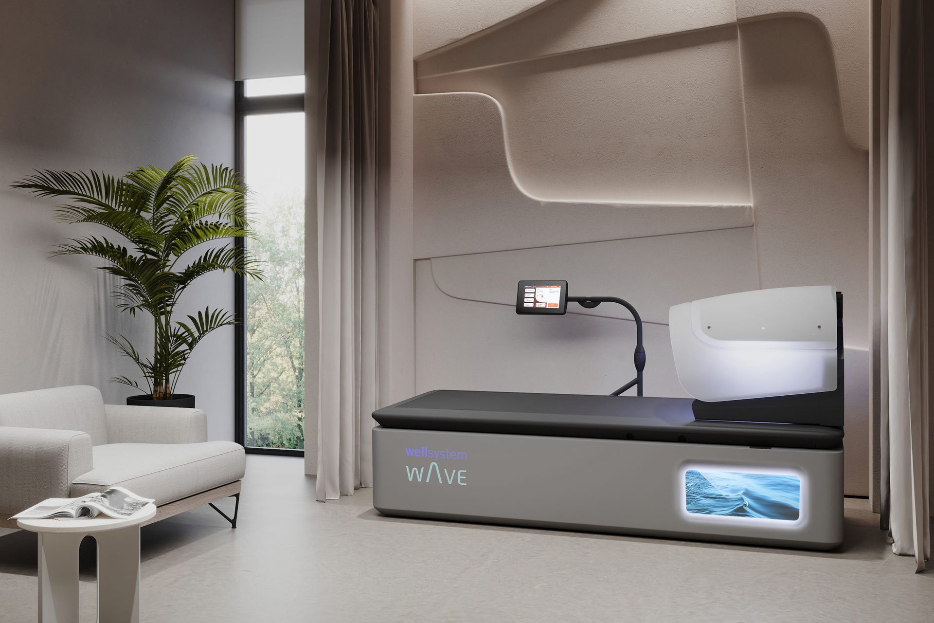 Modern wellness room with a gray floatation bed, screen, and plant.