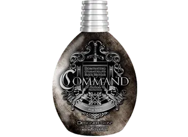 Tanning lotion bottle with silver cap and dark ornate label. 