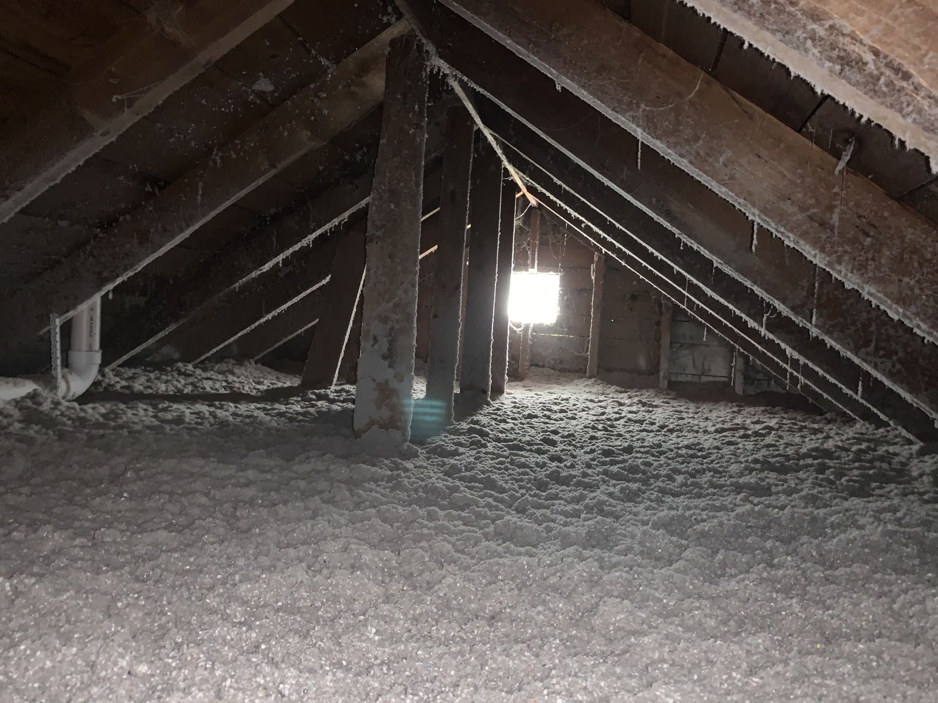 A person is holding a pile of sand in their hands.