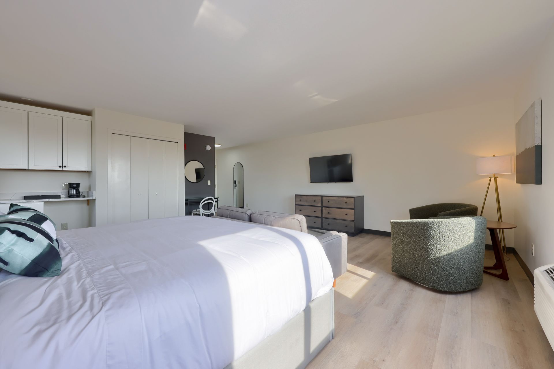 There is a large bed in the middle of the room.