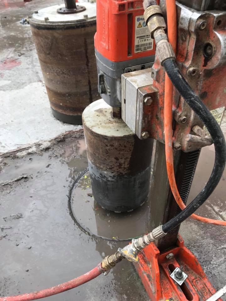 Photo Of Concrete Wall And A Drill — Watson, LA — Capitol City Concrete Cutters LLC