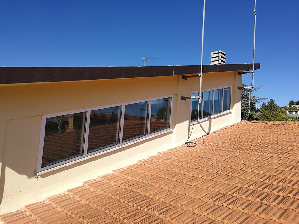 finestre a scorrimento per ultimo piano di palazzo