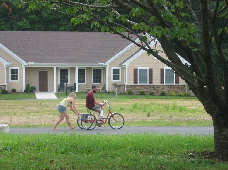 resident riding a bike