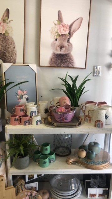 A shelf with a picture of a rabbit on it