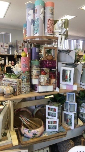 A display of candles and other items in a store