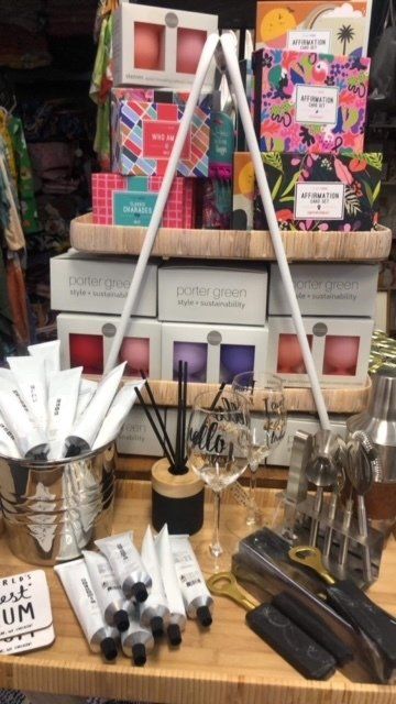 A wooden table with a bunch of boxes on it