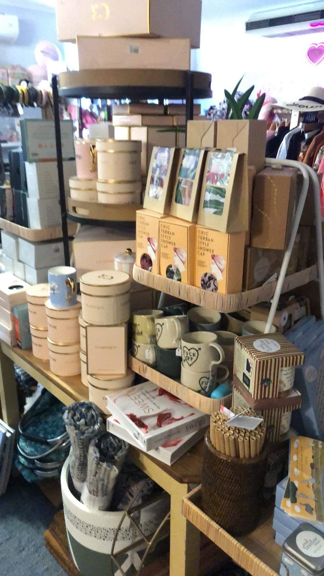 A store filled with lots of boxes and mugs on display.