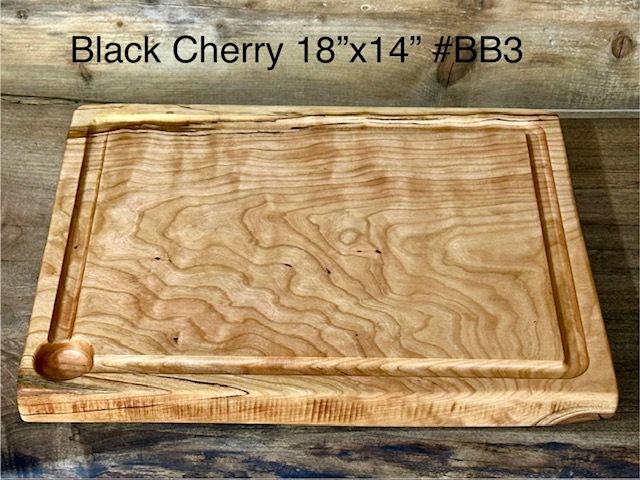1 piece cutting board that's perfect for the pellet smoker. Large Black Cherry Solid Wood Cutting Board.