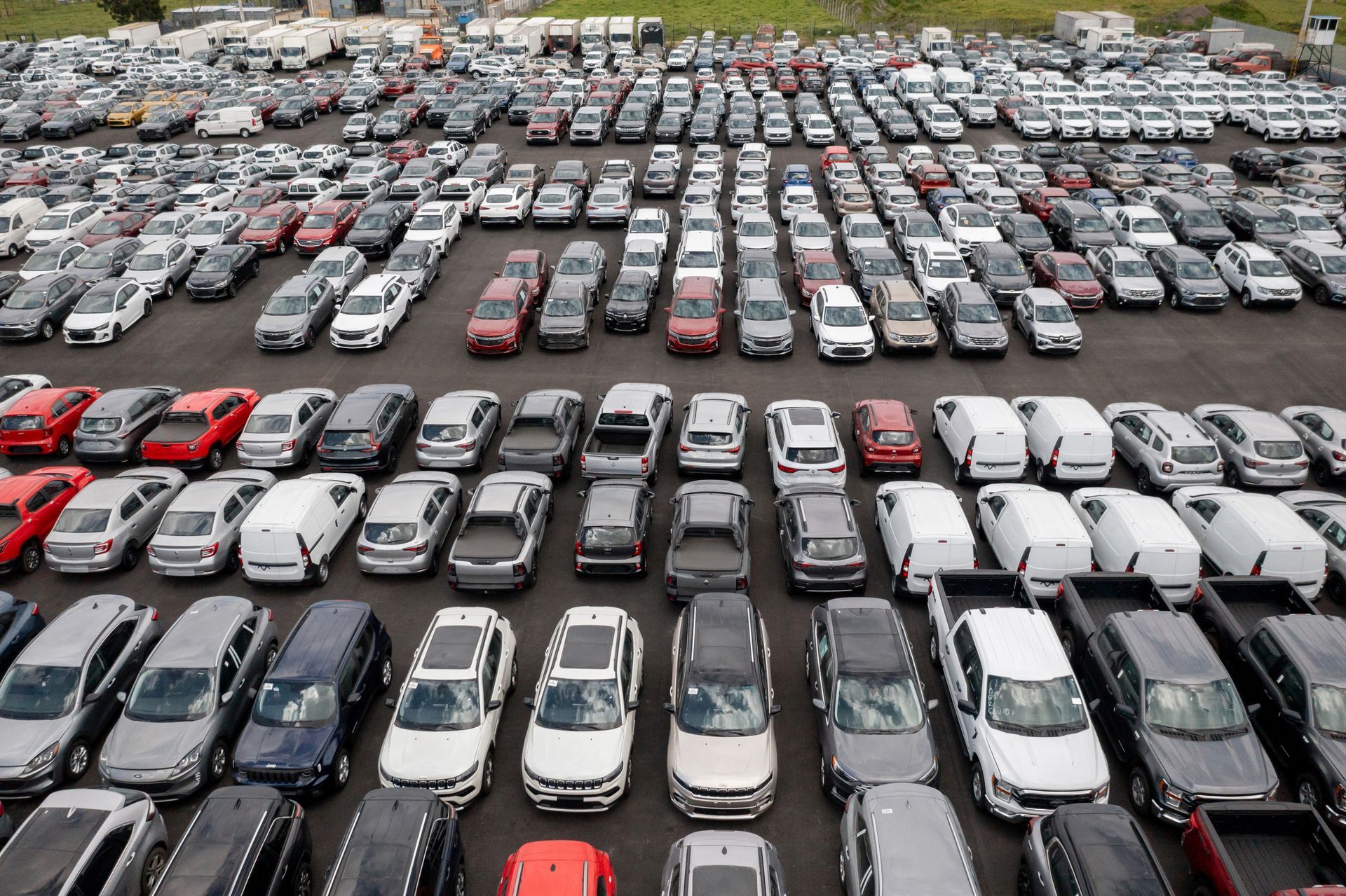 Fleet of parked vehicles highlighting commercial auto insurance.