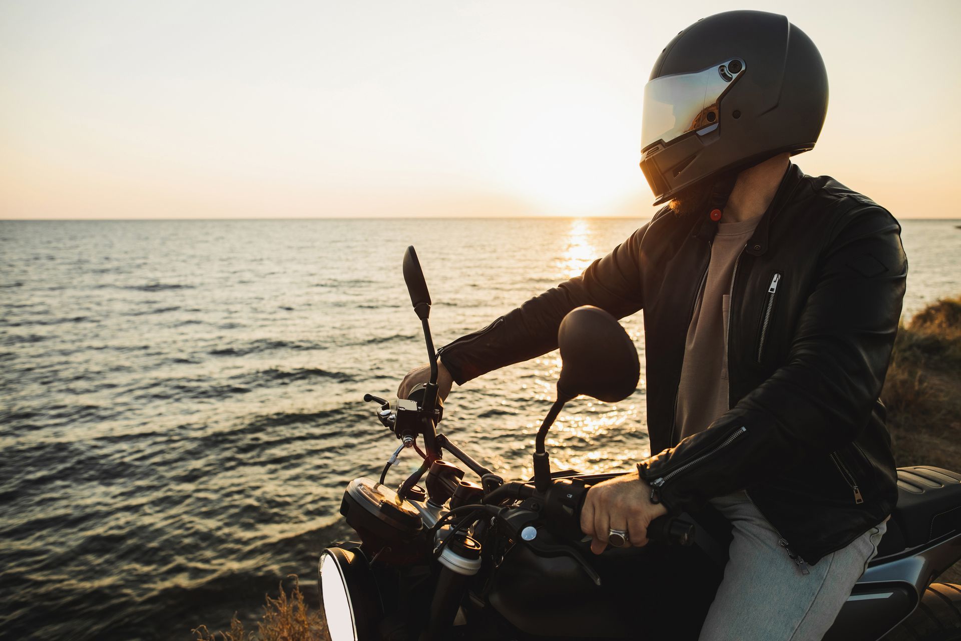 Biker in a helmet on his motorcycle after getting motorcycle insurance in Loganville, GA