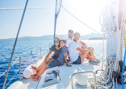 Boat Insurance — Family with Adorable Kids Resting on Yacht in Decatur, GA