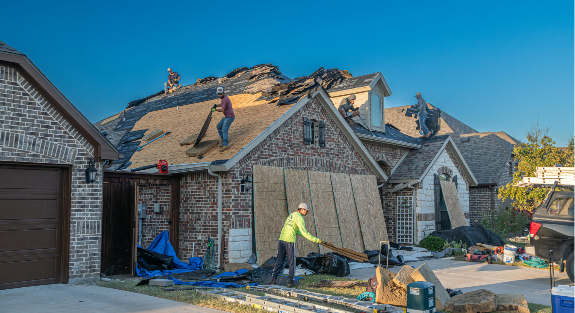 Brookland Roofing Team working on a residential roof in Brookland, AR