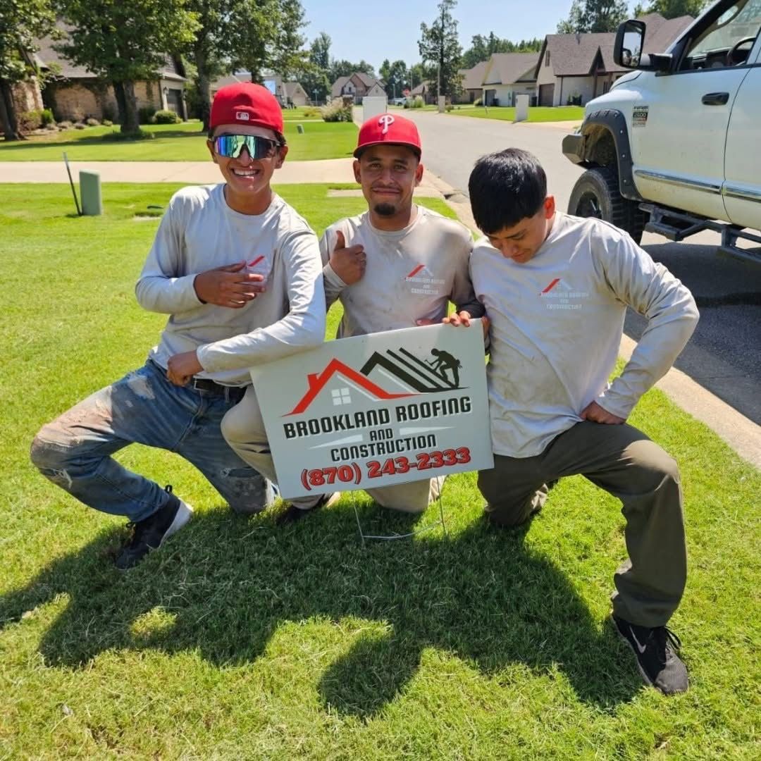 Brookland Roofing Team in front of a residence in Brookland, AR
