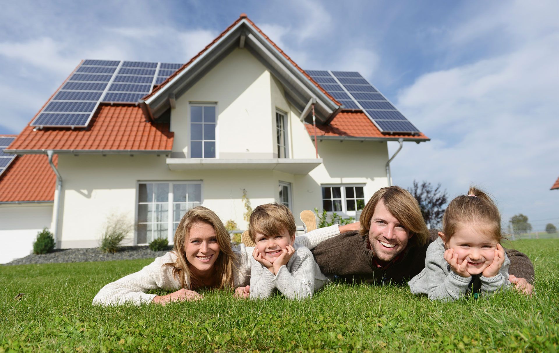 Happy Family in Front of Buffalo, NY Home