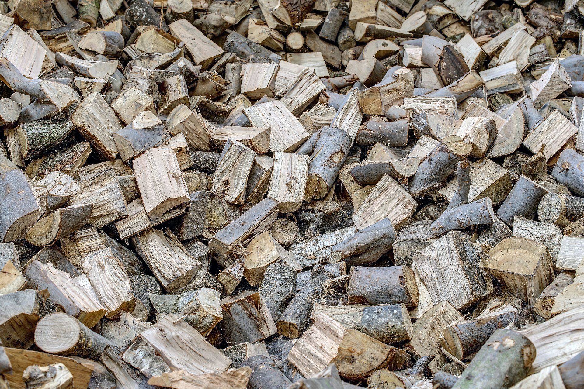 A very large pile of wood logs for log fires and burning