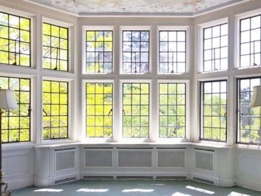 How much do vinyl replacement windows Cost?
