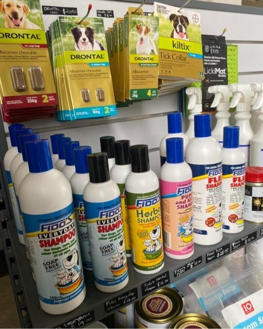 Many Bottles of Dog Shampoo Are on A Shelf — Edmonds Landscaping Supplies in Bohle Plains, QLD