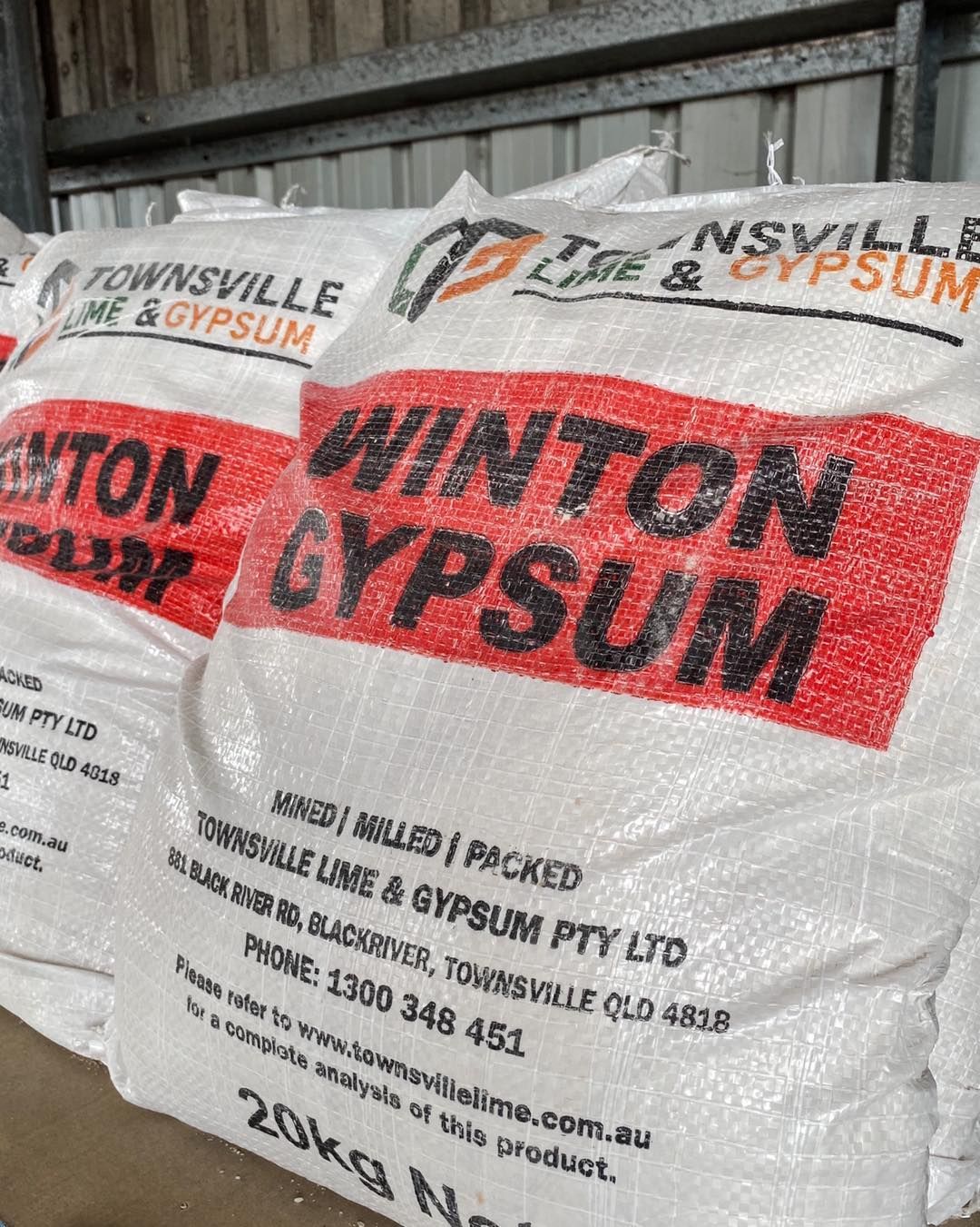 Two Bags Of Winton Gypsum Are Stacked On Top Of Each Other — Edmonds Landscaping Supplies in Bohle Plains, QLD
