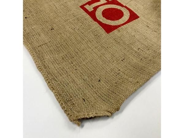 A Piece of Cloth with A Red Square with The Letter O on It — Edmonds Landscaping Supplies in Bohle Plains, QLD