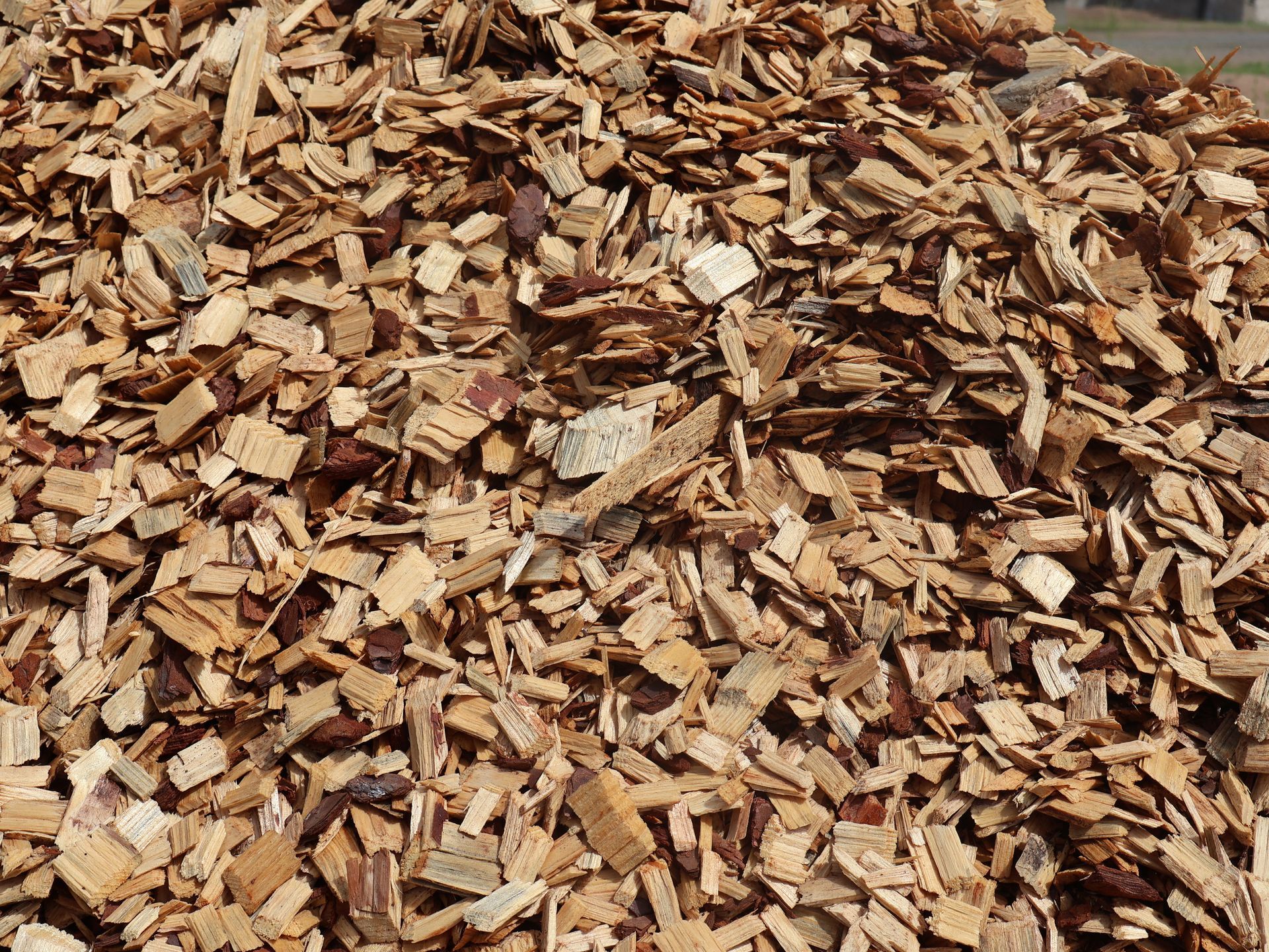 Pile of Dirt is Being Scooped Up by a Bulldozer — Edmonds Landscaping Supplies in Bohle Plains, QLD