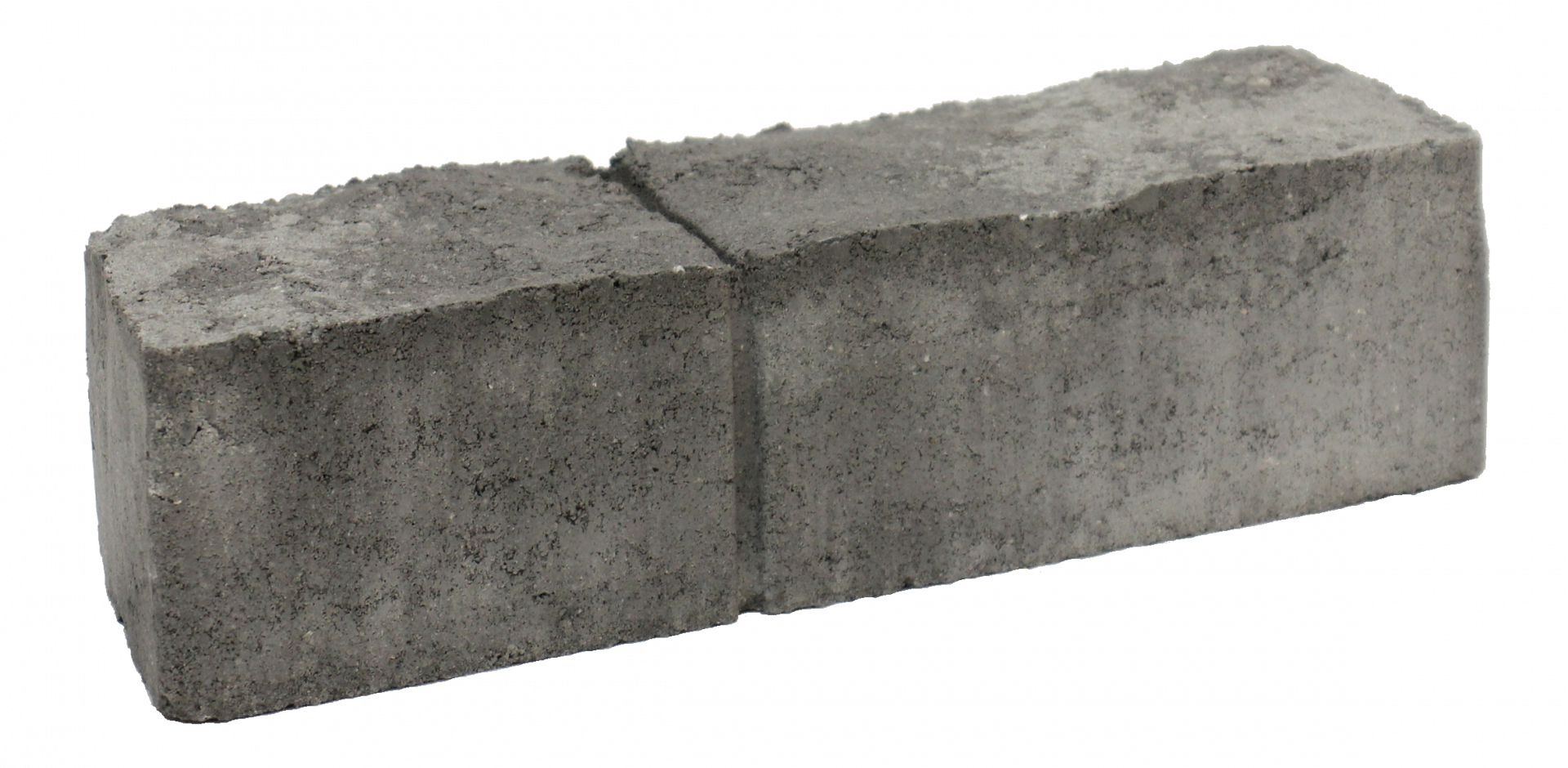 A Gray Brick Is Sitting On A White Surface — Edmonds Landscaping Supplies in Bohle Plains, QLD