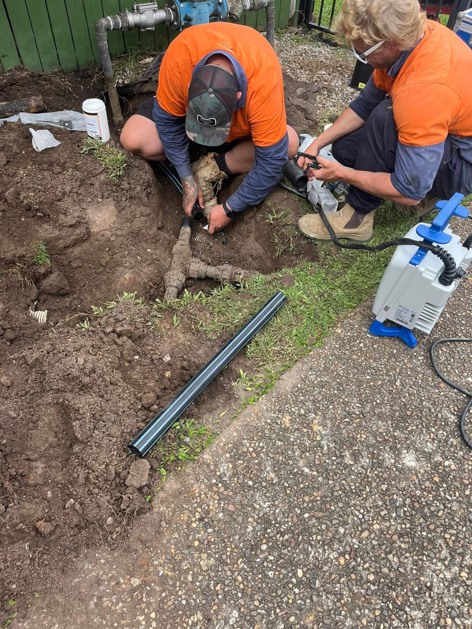 A Blue Pipe With Two Valves Attached to It — Gold Coast Leak Detection in Robina, QLD