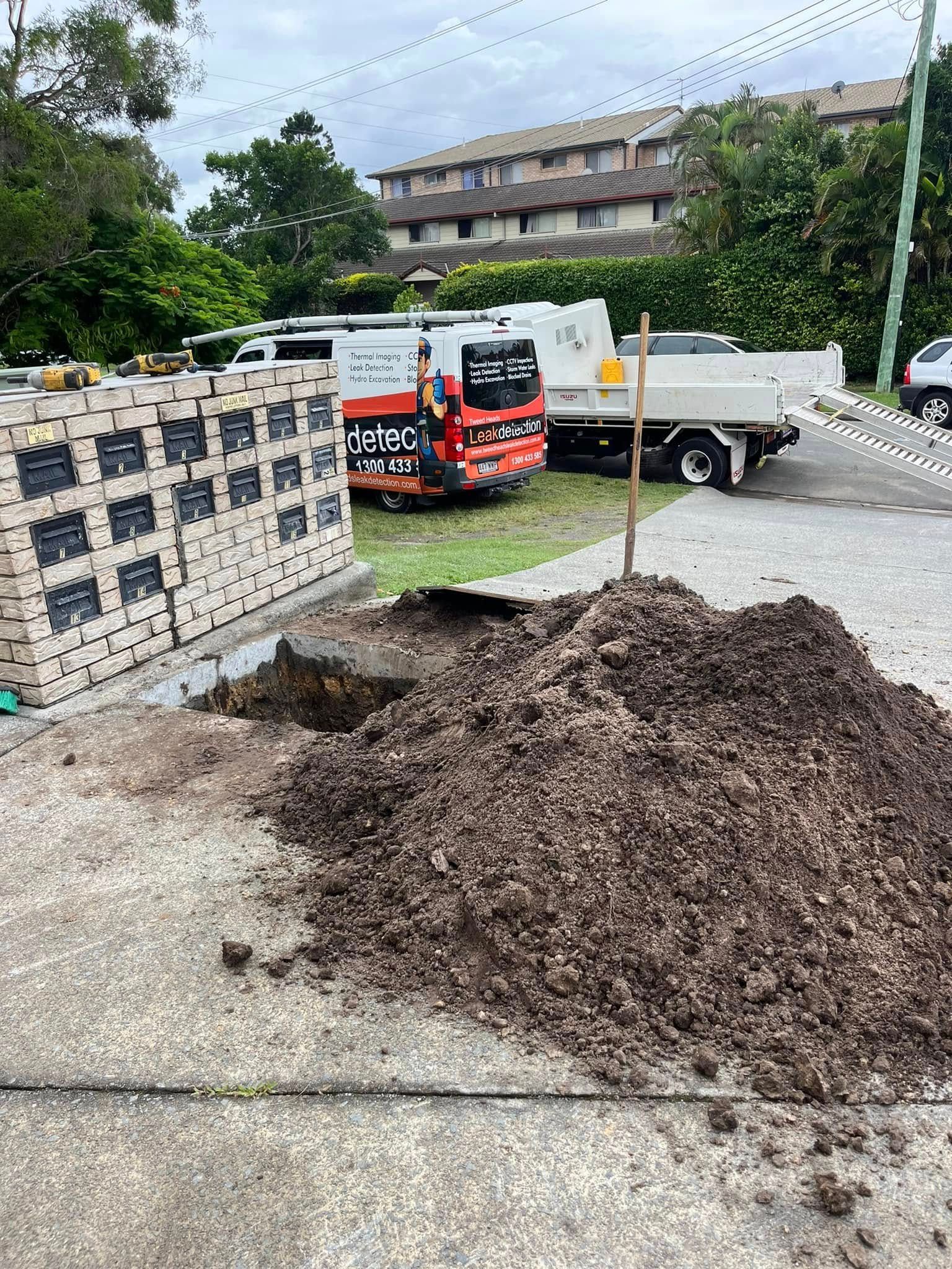 Pile of Dirt Next to a Hole and Stacked Paving Stones — Gold Coast Leak Detection in Tallebudgera, QLD
