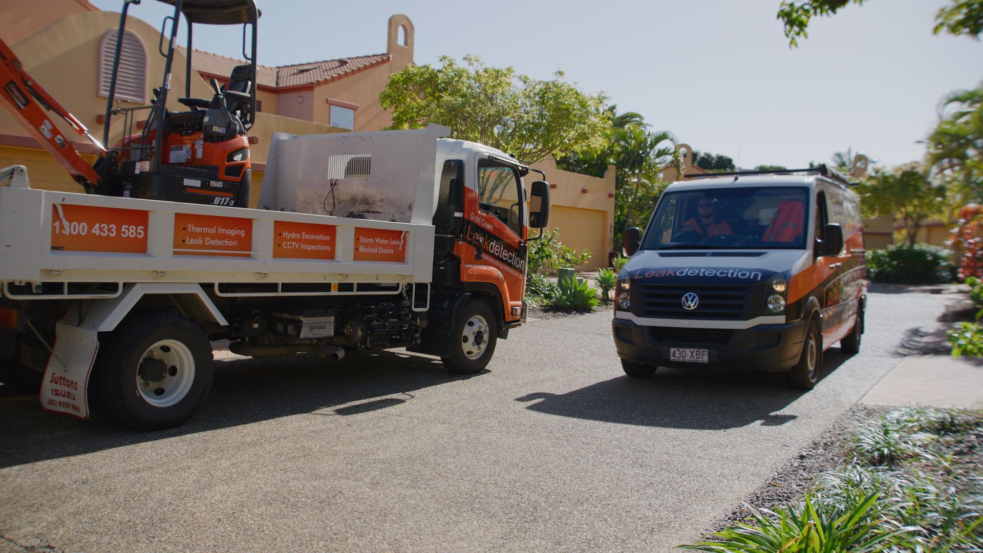 A Man Is Working On A Pipe In The Dirt  — Gold Coast Leak Detection In Palm Beach, QLD