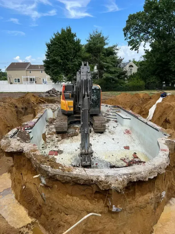 Swimming Pool Being Demolished