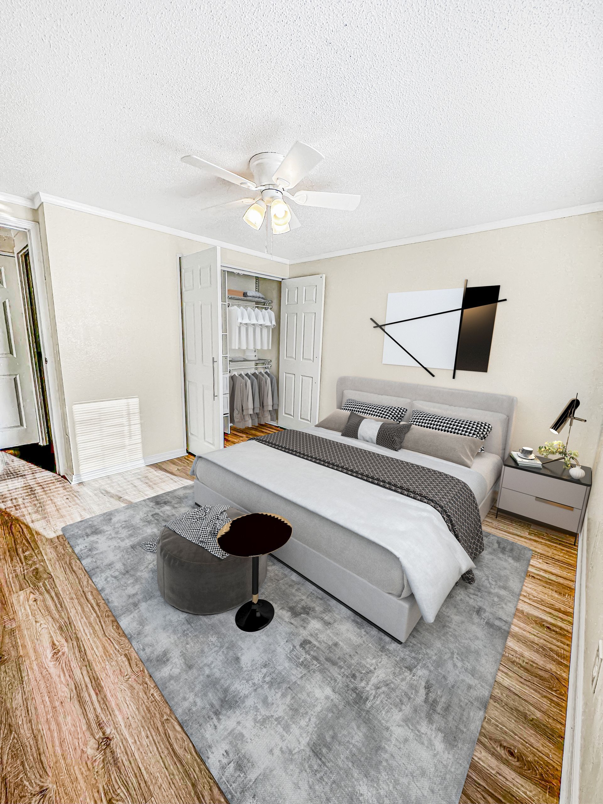 Photo of a bedroom with a closet in the corner