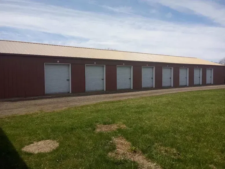 Red storage units with white doors.