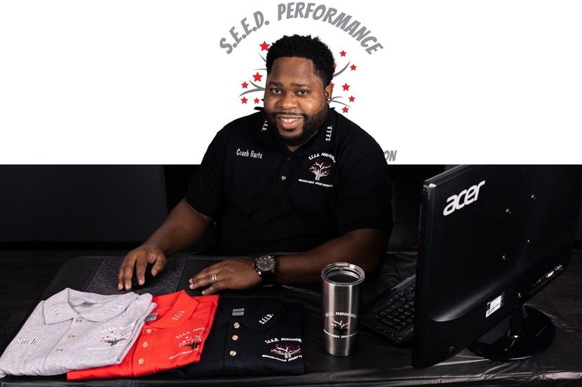 A gray circle with a silhouette of a person in it.