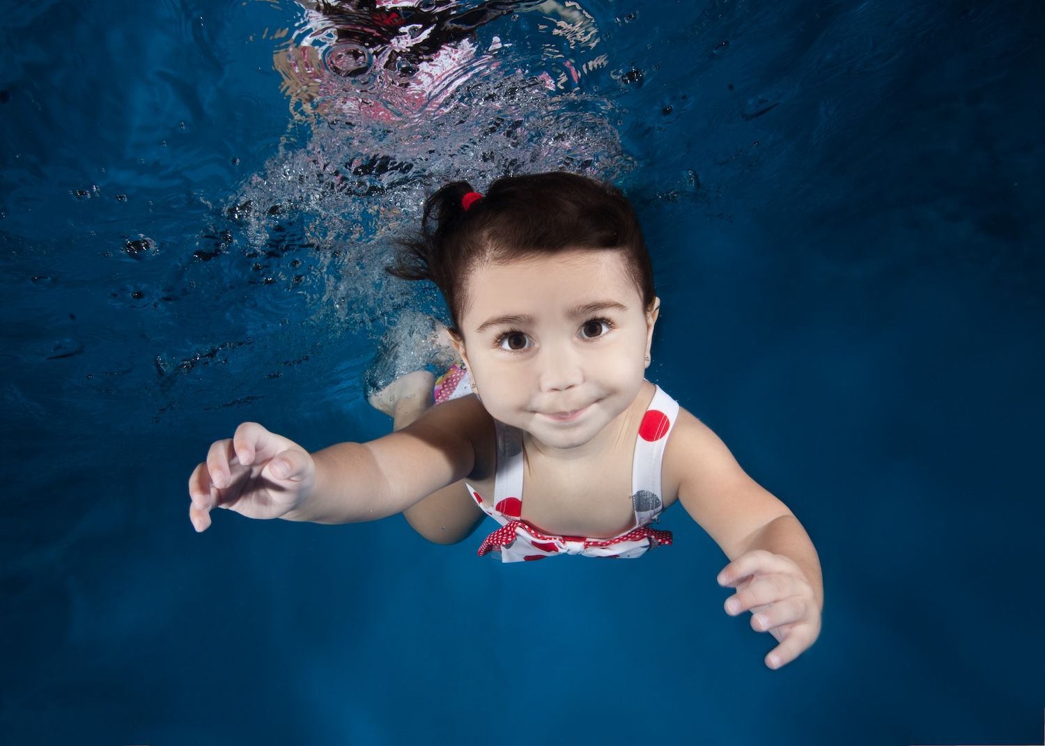 Baby swimming underwater