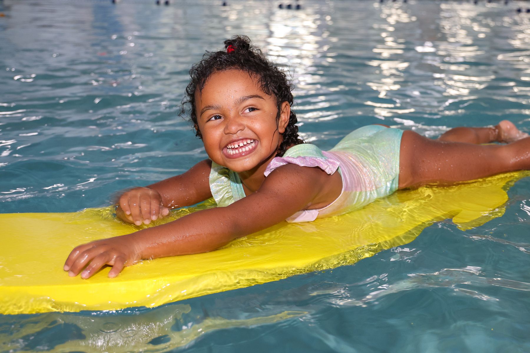 Photo of a Little Girl in the Pool