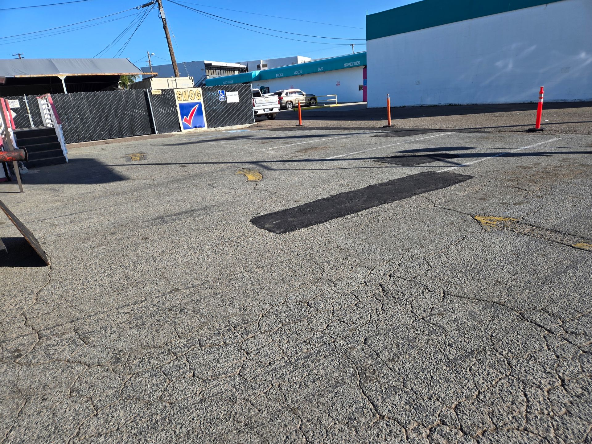 A parking lot with a hole in the middle of it