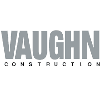The logo for vaughn construction is gray and black.