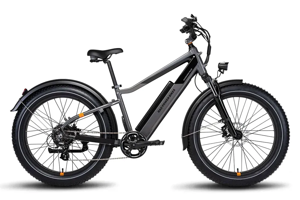 A gray and black electric bike on a white background.