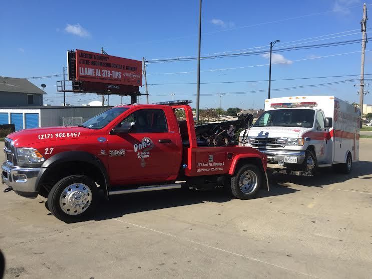 Towing A White Vehicle — Champaign, IL — Don’s 24 Hour Towing