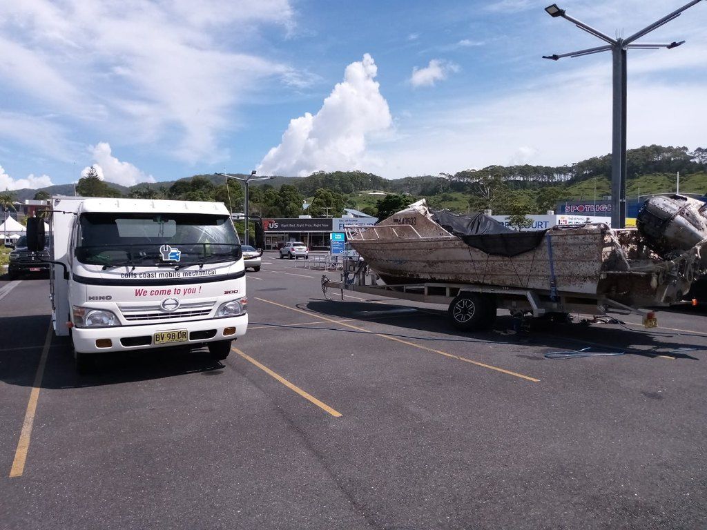 A White Truck With a License Plate That Says 'NZ' on It — Coffs Coast Mobile Mechanical in Toormina, NSW