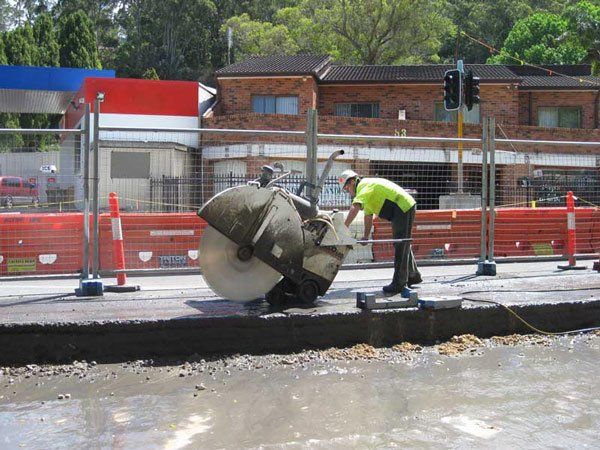 using a cutter on an airport road