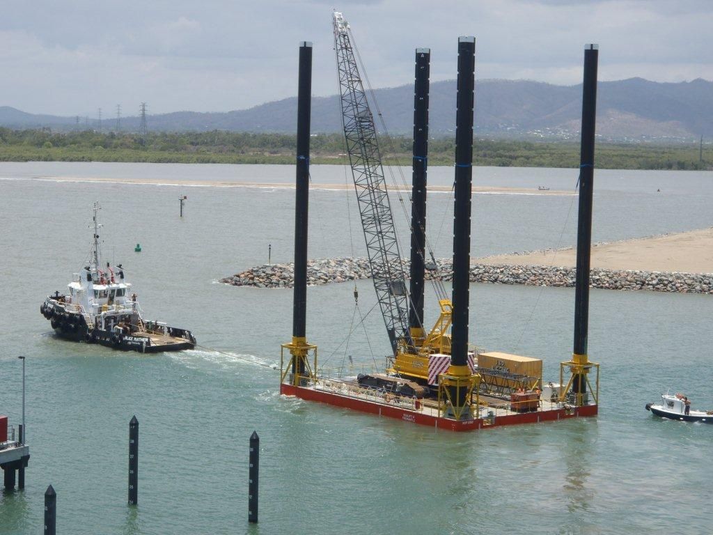 A Couple Of Cranes Are Sitting Next To Each Other On A Construction Site — J & D Rigging Pty Ltd In Bohle, QLD