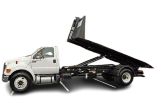 A white dump truck with a black bed is parked in a parking lot.