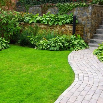 Garden Stone Path with Grass — East Brunswick, NJ — Iovino's  Landscaping Inc.