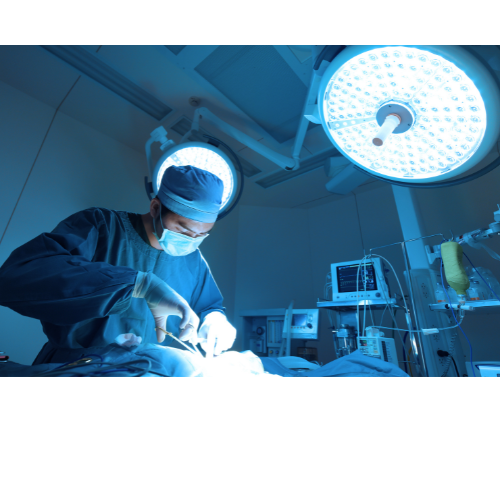 A surgeon is operating on a patient in an operating room