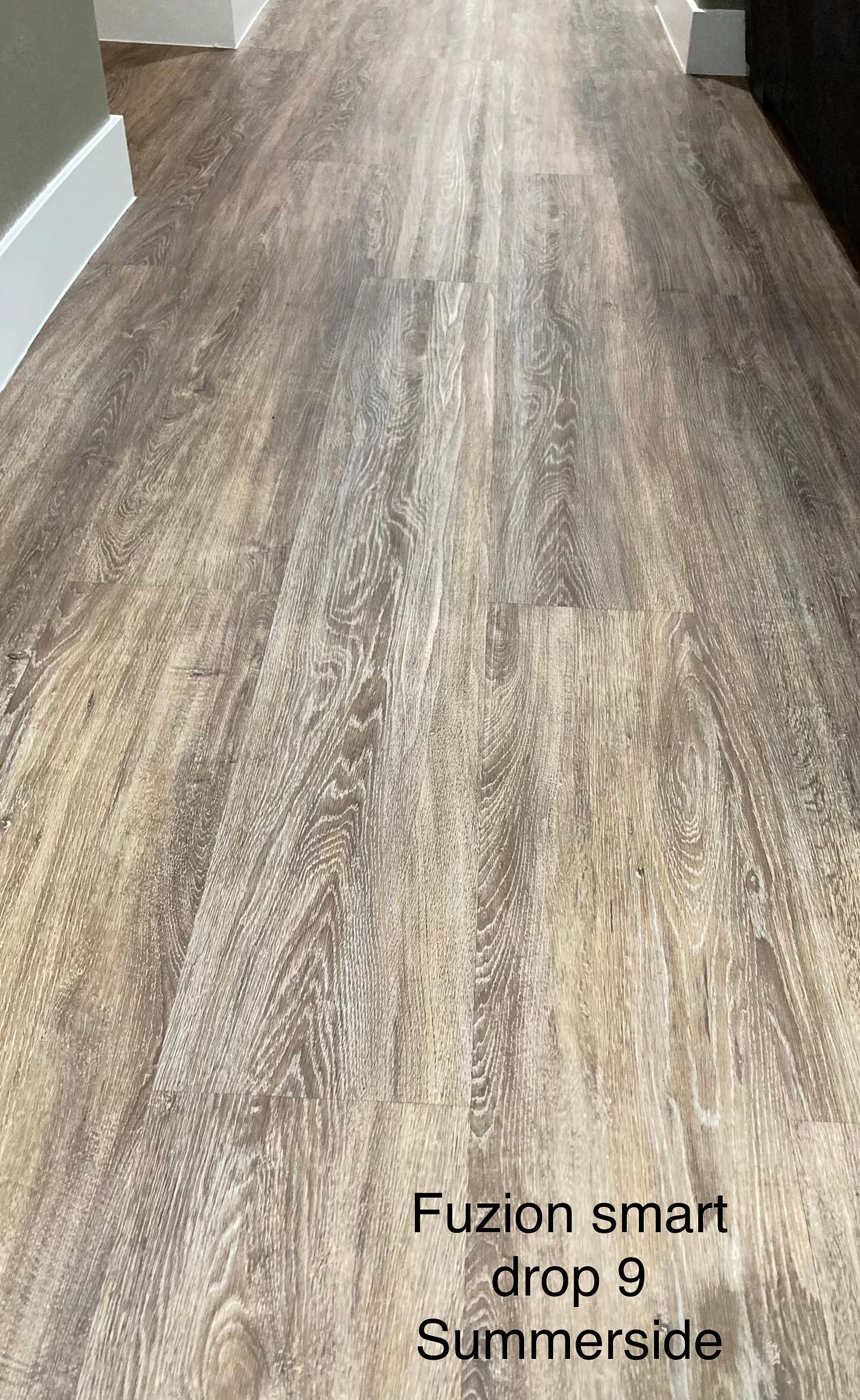 Wood-look flooring in a hallway, labeled 