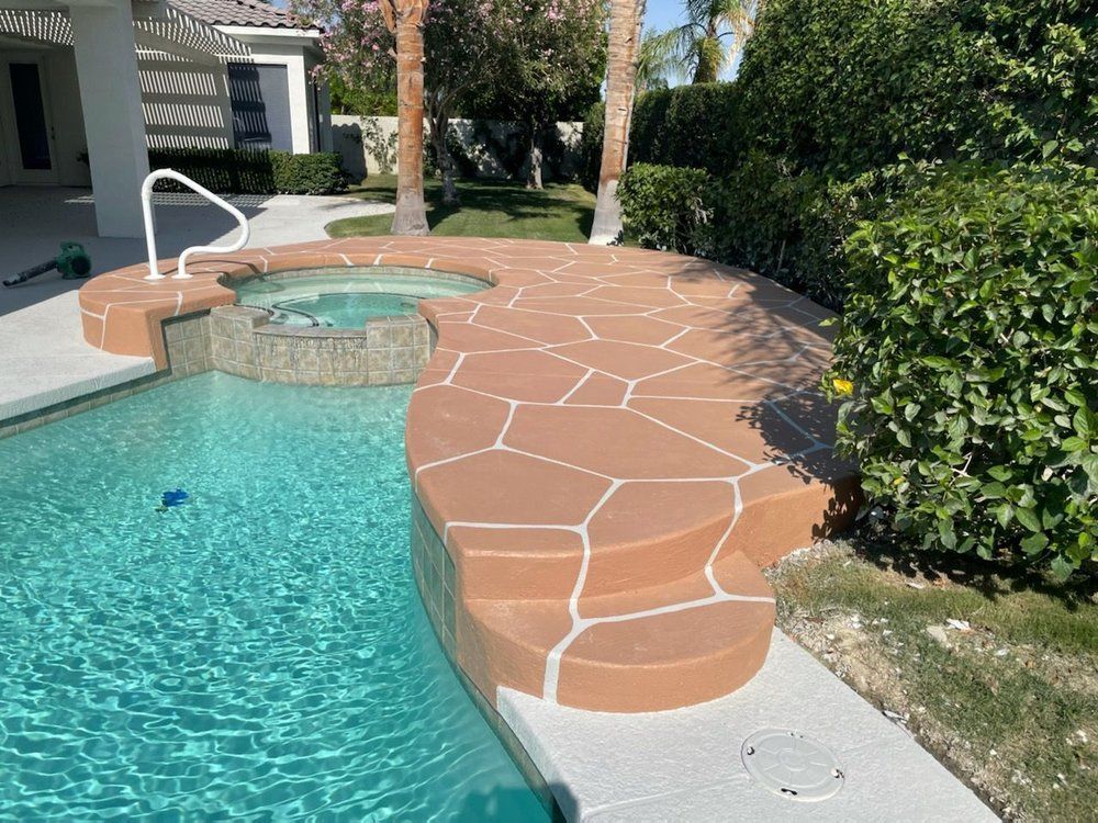 Stamped concrete around pool