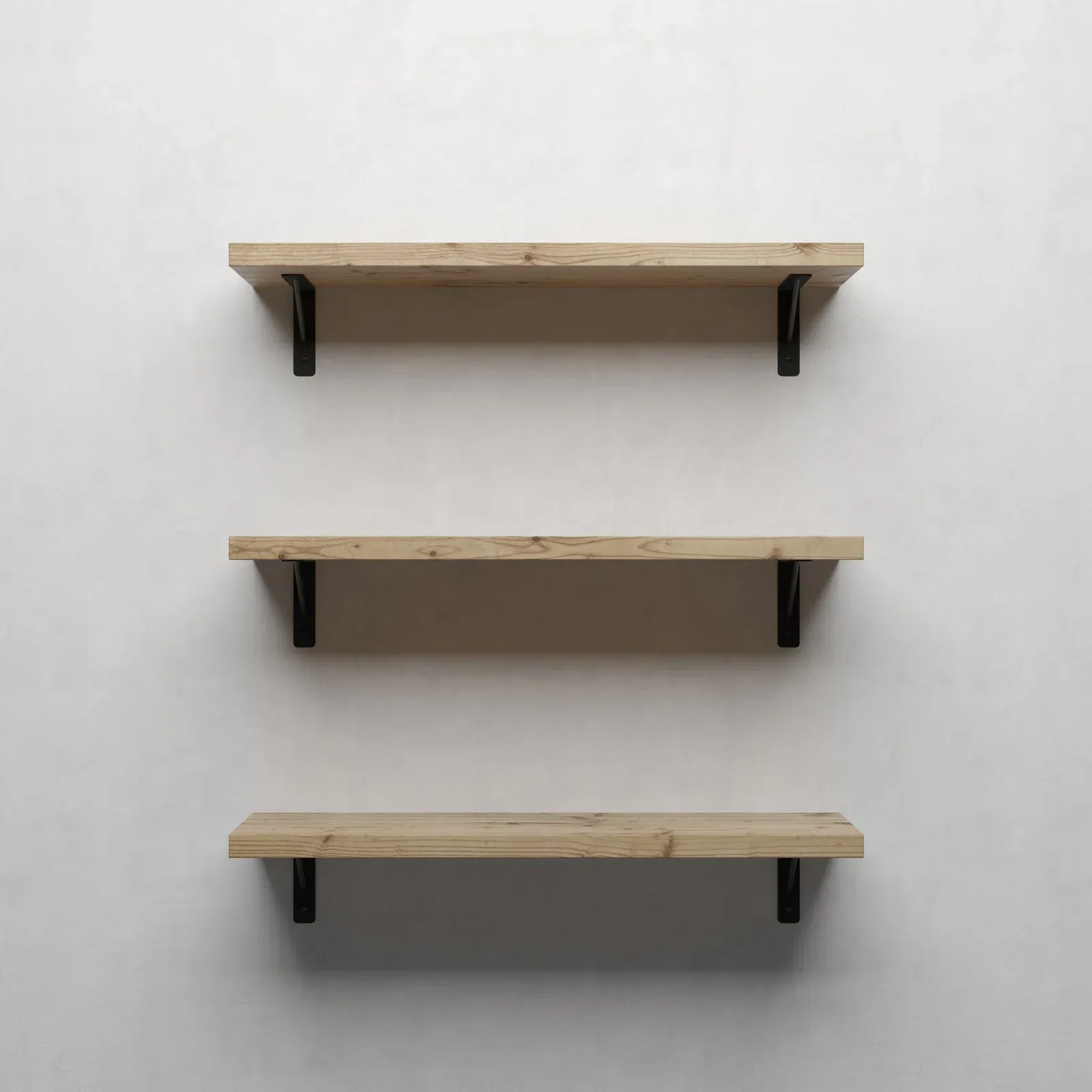 Small bathroom with green vanity, white toilet, and light wood-look flooring.