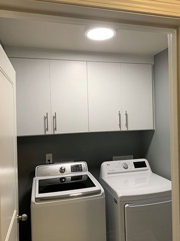 There is a washer and dryer in the laundry room.