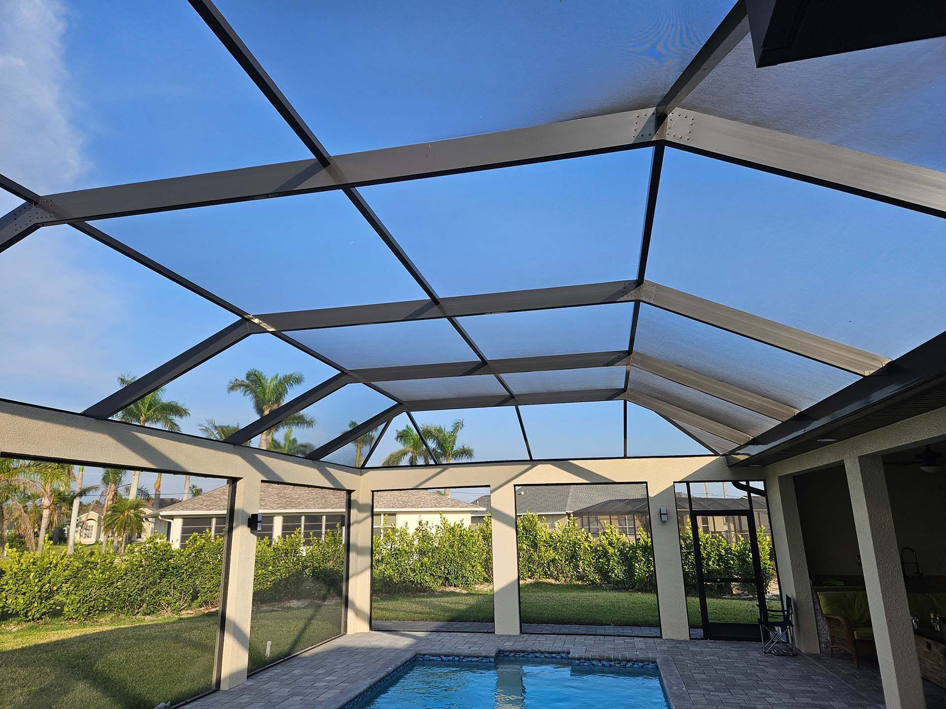 Nice swimming pool with clear roof — St. Cloud, FL — MJ’s Home Solutions LLC